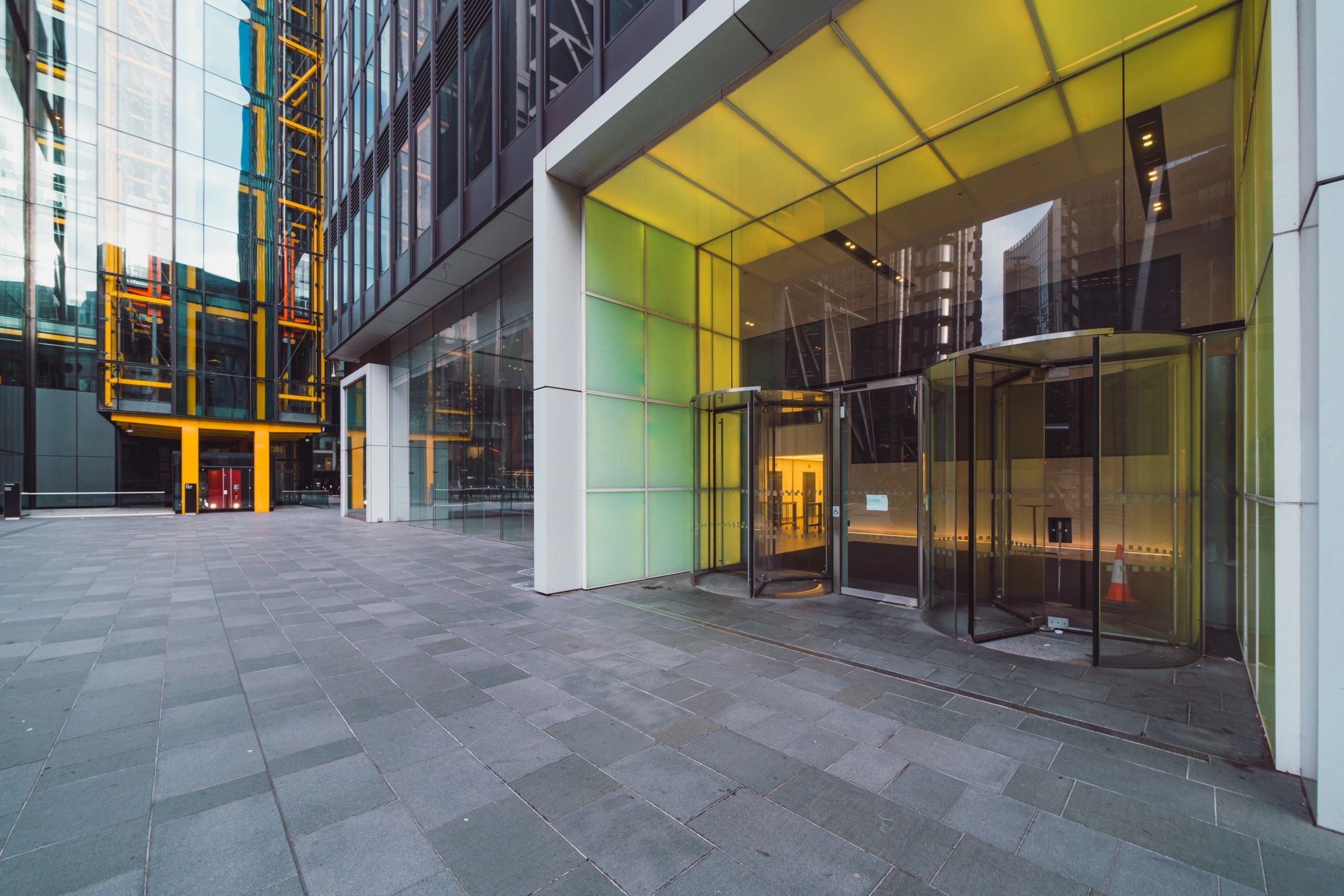 Modern office building entrance with glass facade